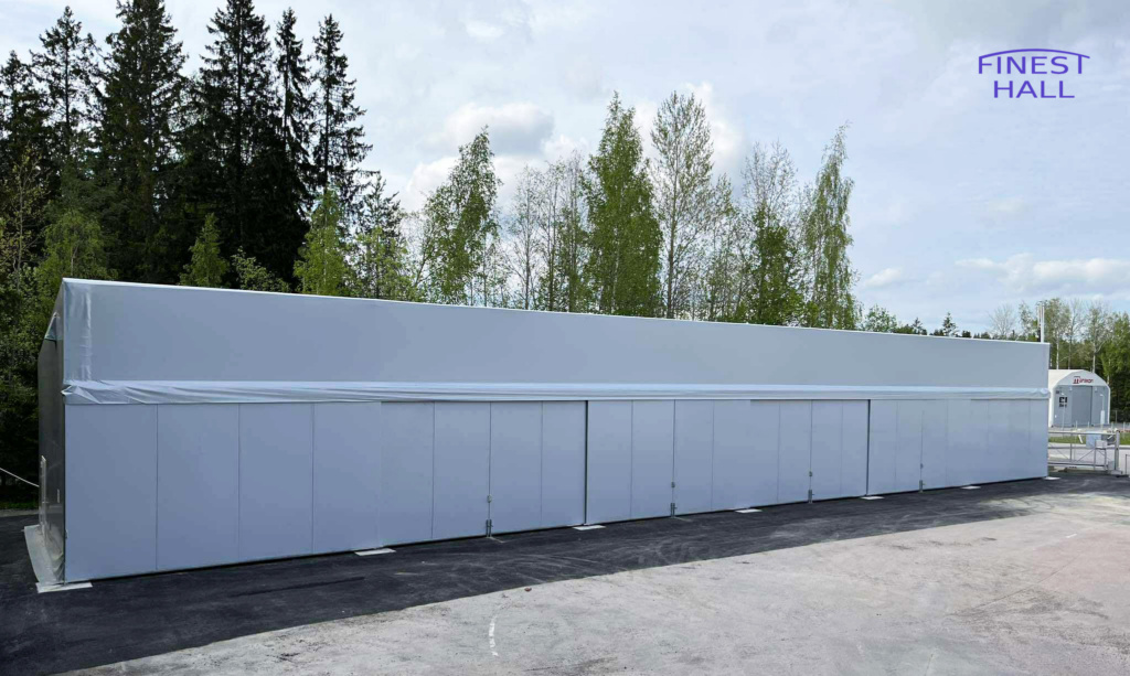 Finest-Hall Factory OÜ toodetud ja paigaldatud varikatus mõõtudega 8x42m, kõrgusega 6,8/5 meetrit Normet MRB Oy-le.